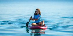 Child,Girl,Is,Riding,Sup,Stand,Up,Paddle,On,Vacation.