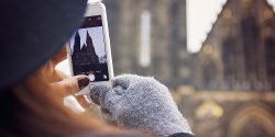 Student taking picture of the Church of St. Ludmila