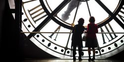 Students at the clock of Musee d'Orsay