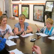 students doing chiese calligraphy