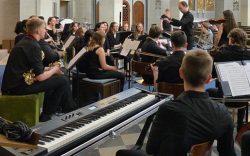 ©Amy Liptrott students performing in church