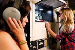 Students interacting with exhibit