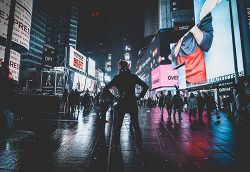 Party Leader standing in Times Square