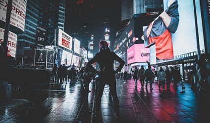 Party Leader standing in Times Square