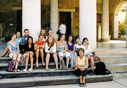 Students sitting on steps, Greece