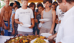 Students enjoying paella lesson