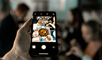 Camera view of paella and students
