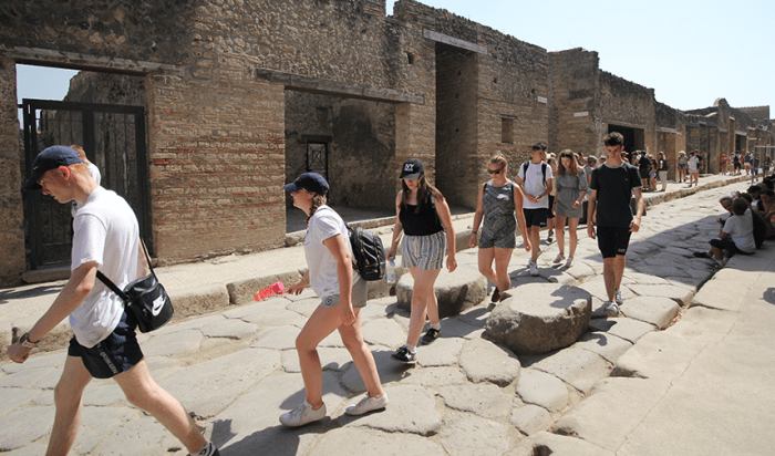 Students walking through Pompeii