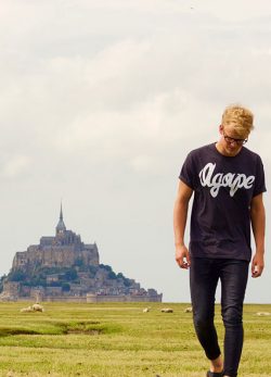 Student with Mont St Michel in the background