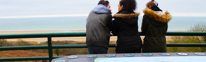 Students overlooking Omaha Beach, Normandy Students overlooking Omaha Beach, Normandy