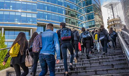 Students walking up steps in Brussels