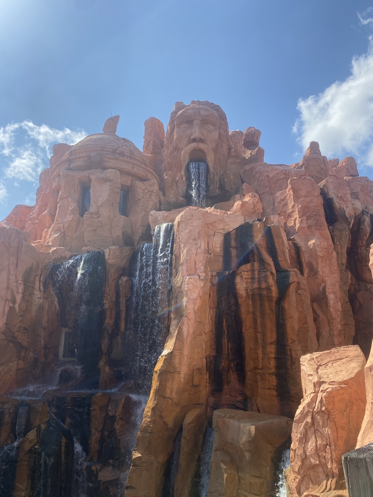 Waterfall coming out of rock's mouth at Universal Studios in Orlando