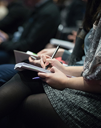 Students taking notes
