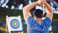 Man,Axe,Throwing,At,Sports,Range,,Archery,Training,Or,Practice