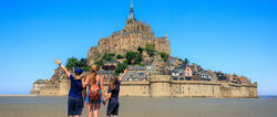 Family,Traveling,In,France-,Famous,Touristic,Of,Le,Mont,Saint