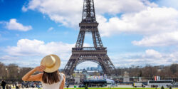 A,Tourist,Woman,Enjoys,The,Beautiful,View,Of,The,Eiffel