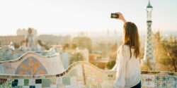 Female,Travel,Photographer/videographer,And,Bloger,Using,Advanced,New,Phone,Camera