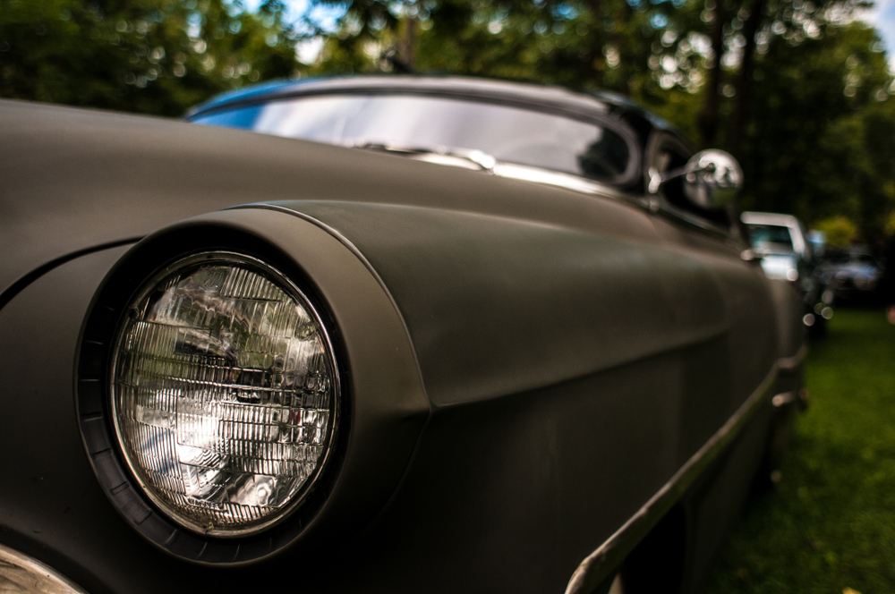 Front of a black Maserati vintage car
