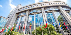View,On,The,European,Parliament,Building,With,Flags,Of,Members