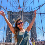 Happy,Girl,At,The,Brooklyn,Bridge,,New,York