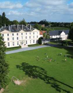 Students outside the front of the Chateau du Molay
