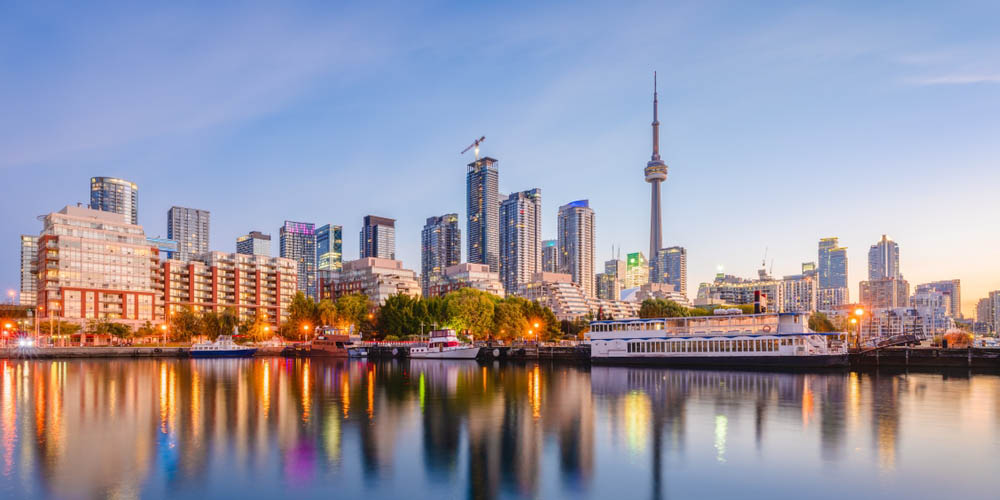 The Toronto city skyline and Lake Ontario at twilight