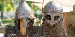 Medieval Norman-style helmets with chainmail