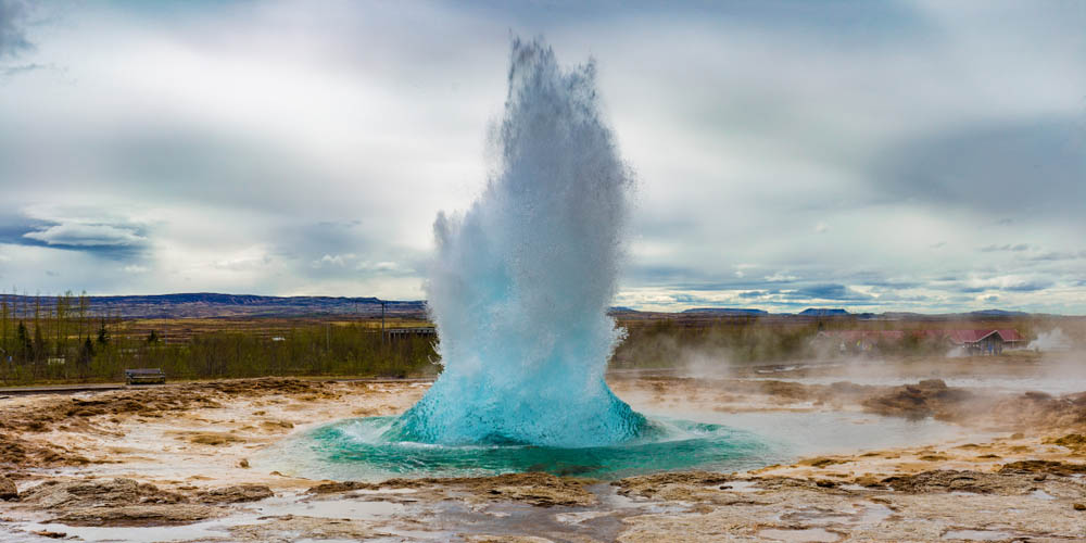 The Great Geysir erupting in spring, Iceland