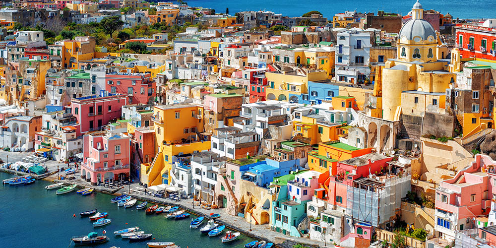 Colourful traditional houses in the Old town port of Procida island, Naples, Italy