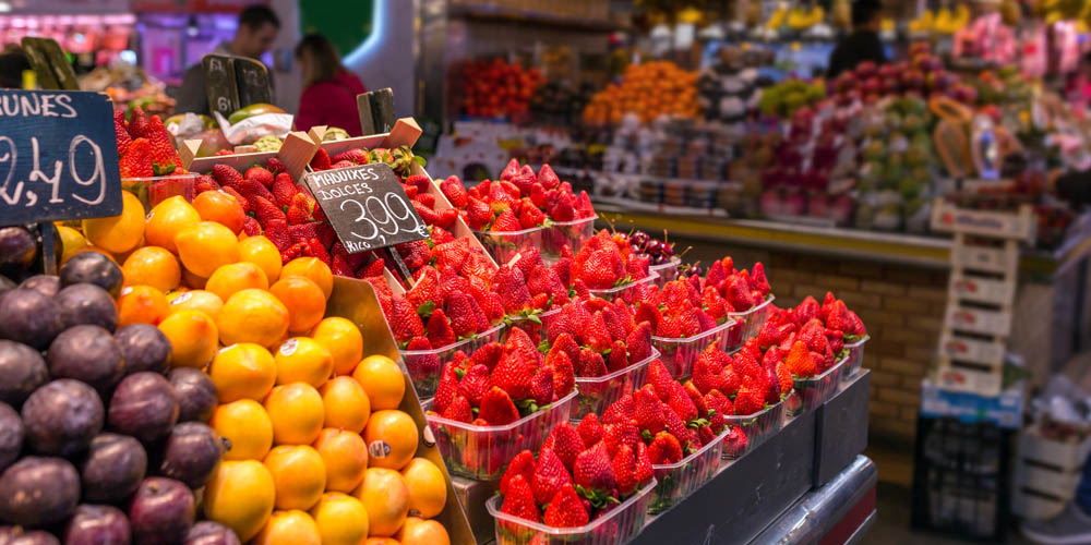 Display of colourful fruits at La Boqueria market, Barcelona