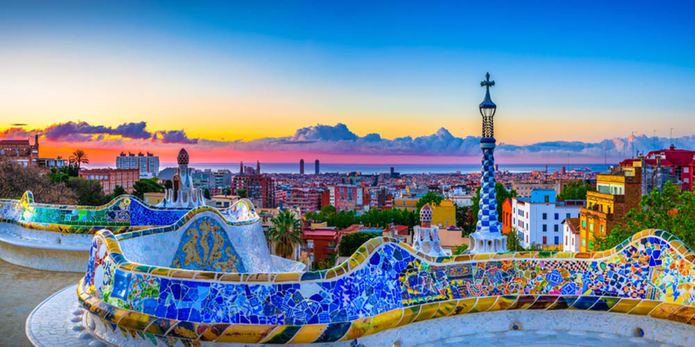 Skyline panorama of Barcelona at sunrise from the famous Parc Guell