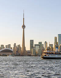 The Toronto harbour and skyline at sunset