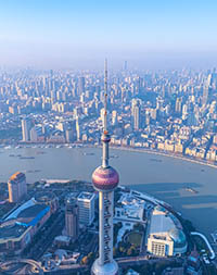 Aerial view of shanghai skyline and winding river at sunrise