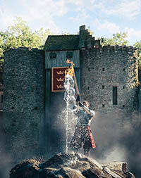 King Arthur pulling out the Sword from the stone at the Puy du Fou