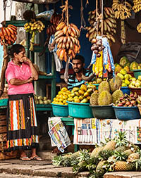 Family selling fruits in Habarana