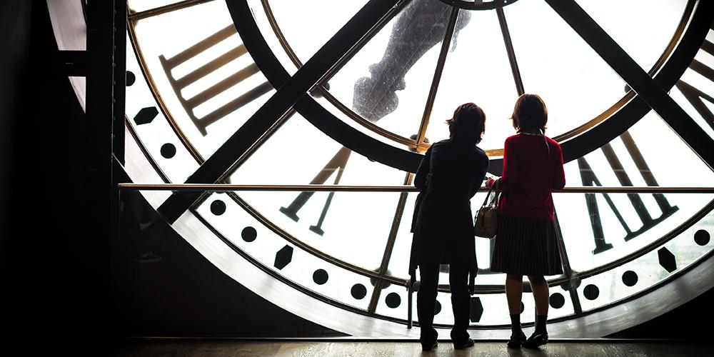 Students at the clock of Musee d'Orsay