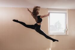 A,Young,Woman,Dancer,In,Black,Clothing,Is,Performs,A