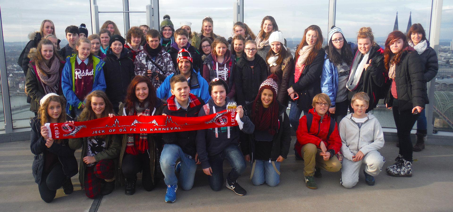 School group holding Cologne scarf School group holding Cologne scarf