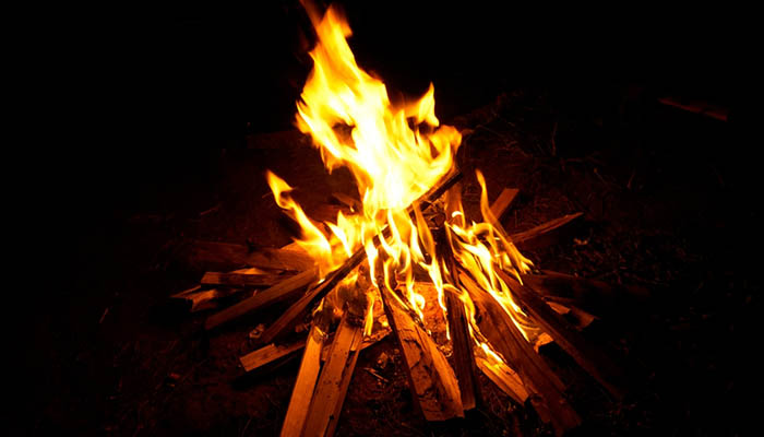 The burning hot beautiful campfire in the night. Campfire Photography