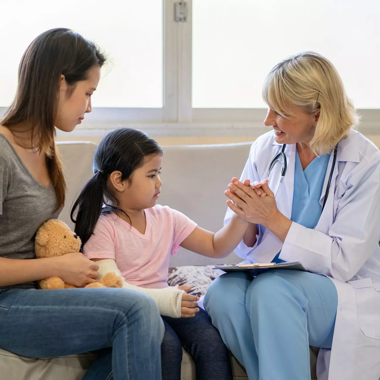 A parent and child with a doctor