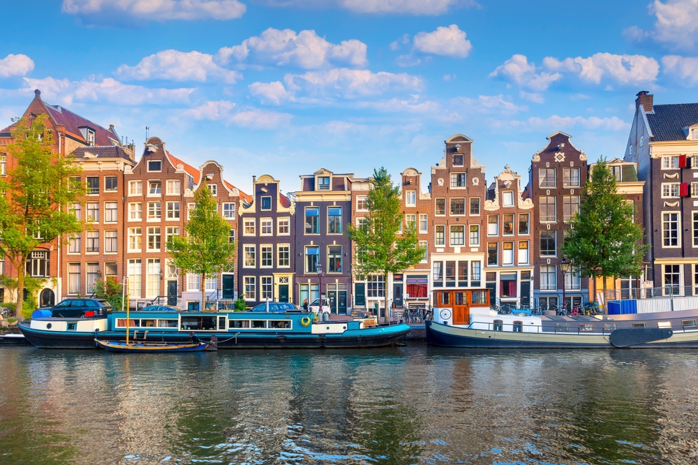 Colourful houses along the Amsterdam canals in Netherlands
