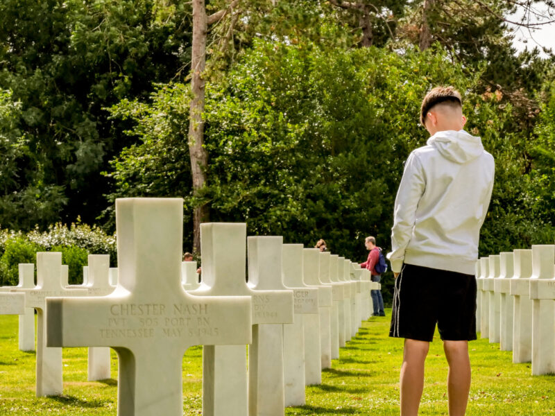 Student at a War Cemetery in Normandy, France