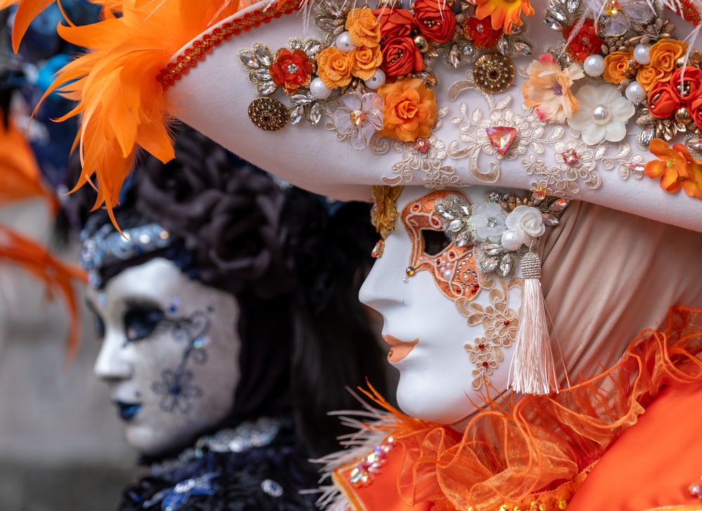 Performers wearing Venitian masks and costumes in Venice, Italy