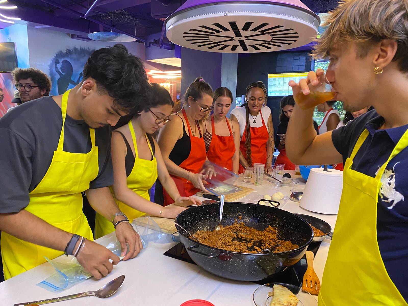 Students at a Paella cooking with Taronja School in Valencia