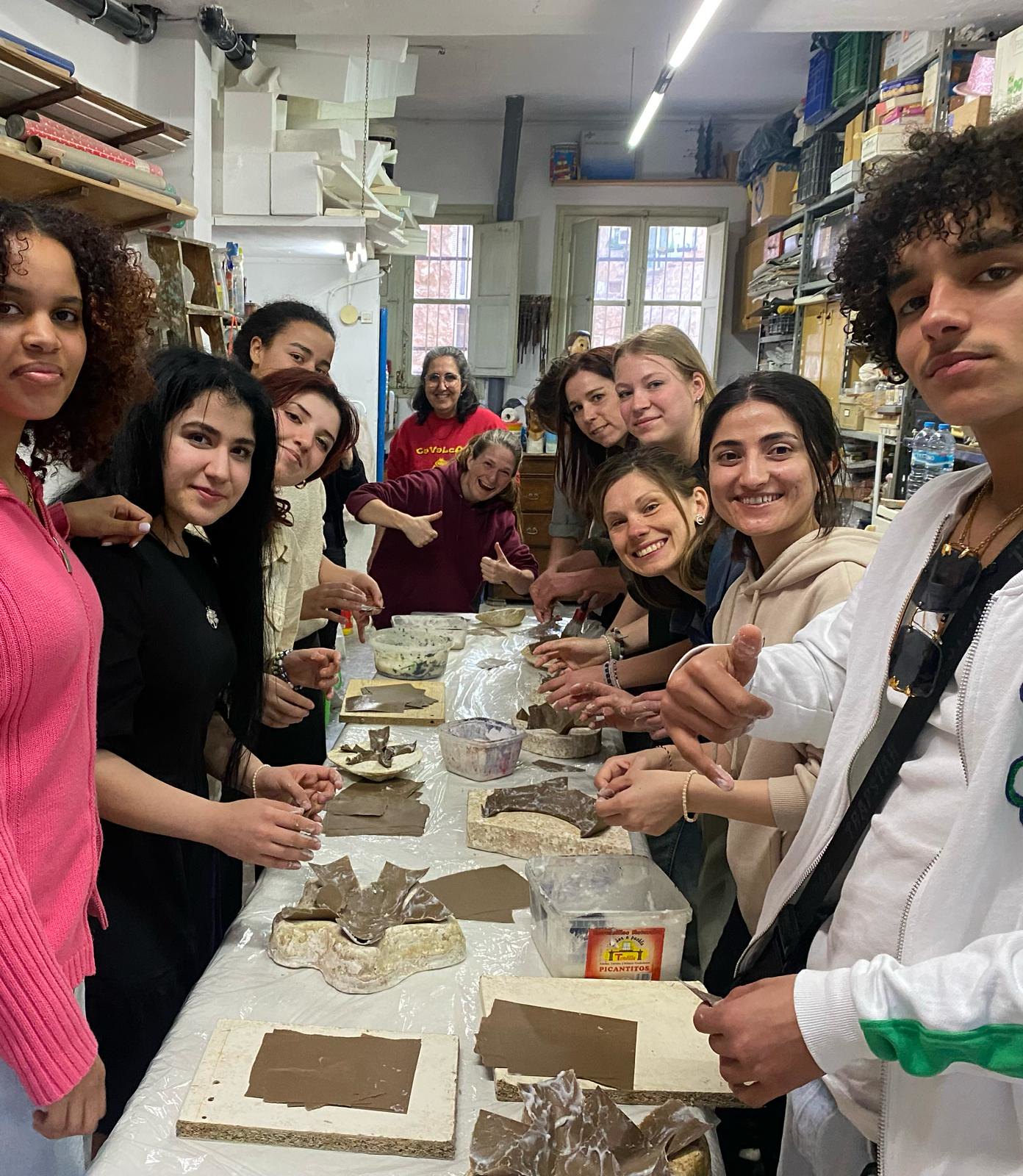Students at a Fallas workshop with Taronja School