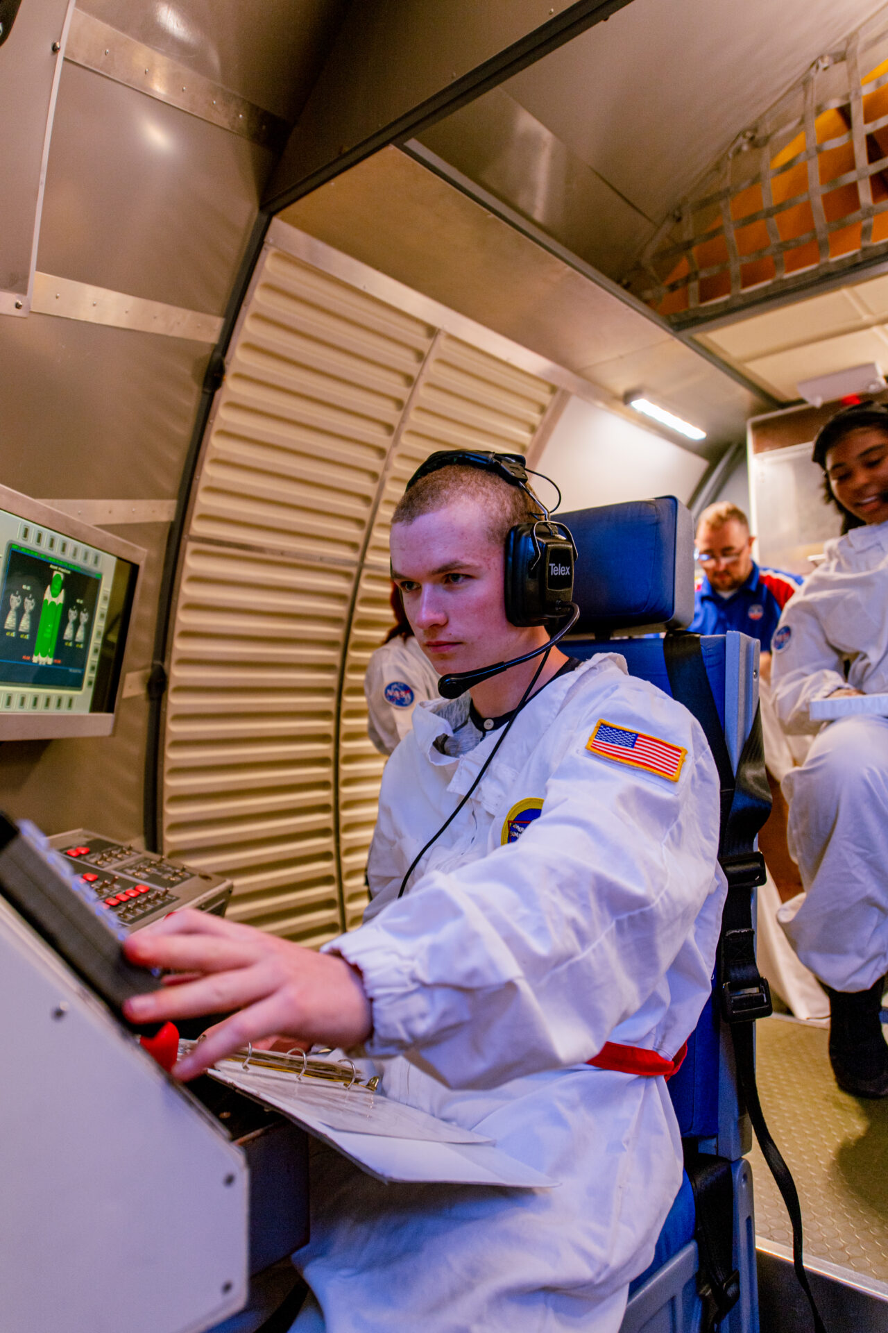 Person in a space suit at Alabama Space Camp