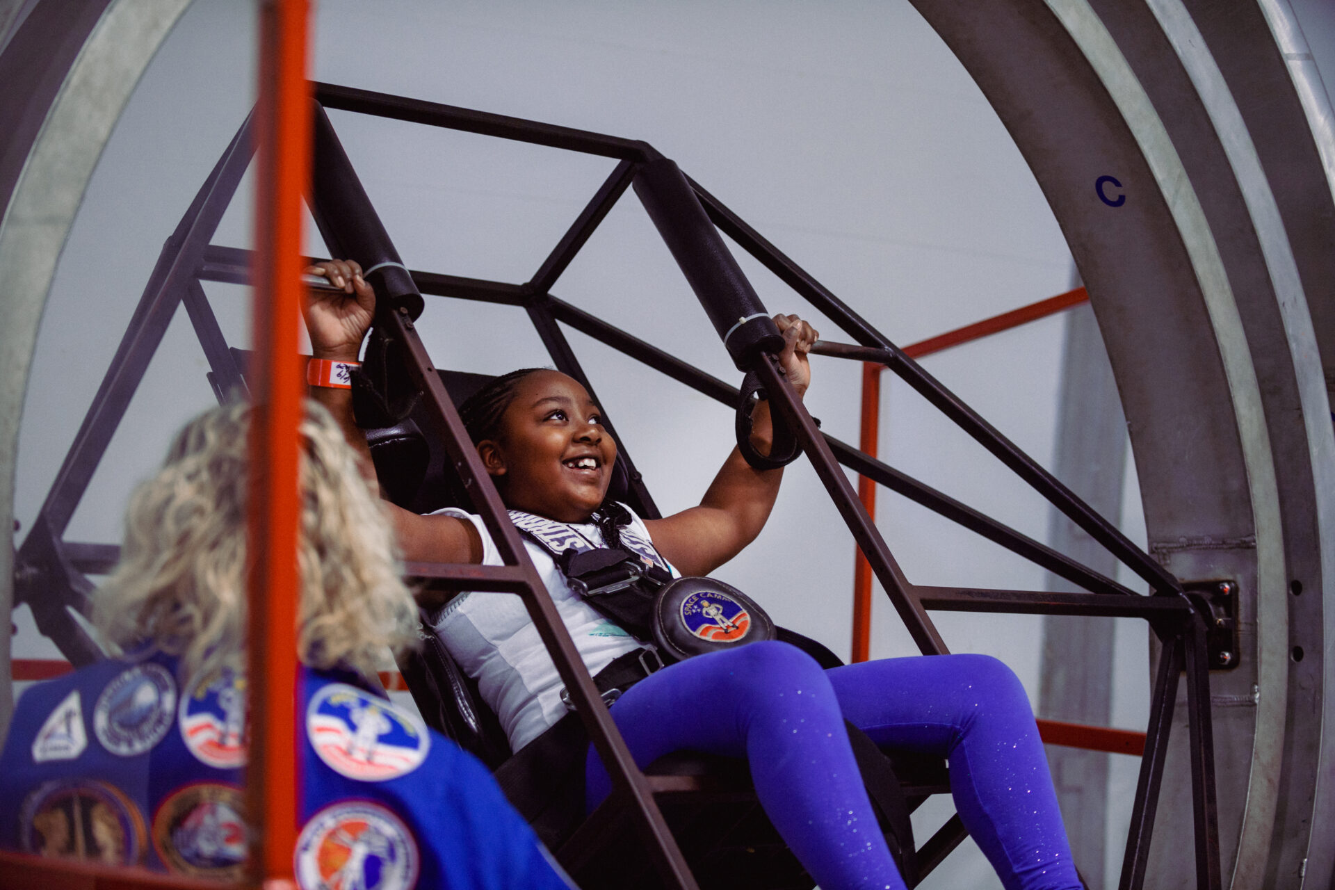 Student girl in a simulator at Alabama Space Camp