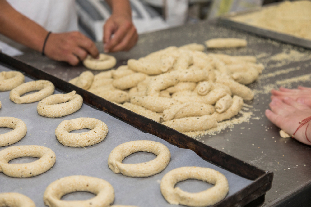 Students preparing bagel dough at a bagel-making class in New York