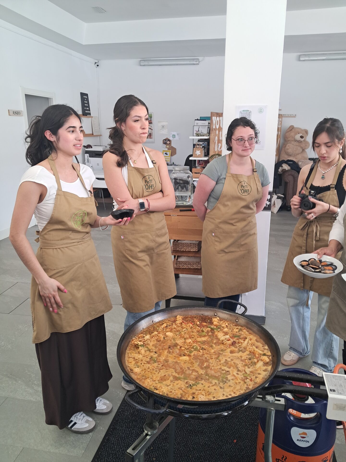 Student group at a Paella cooking class, Madrid