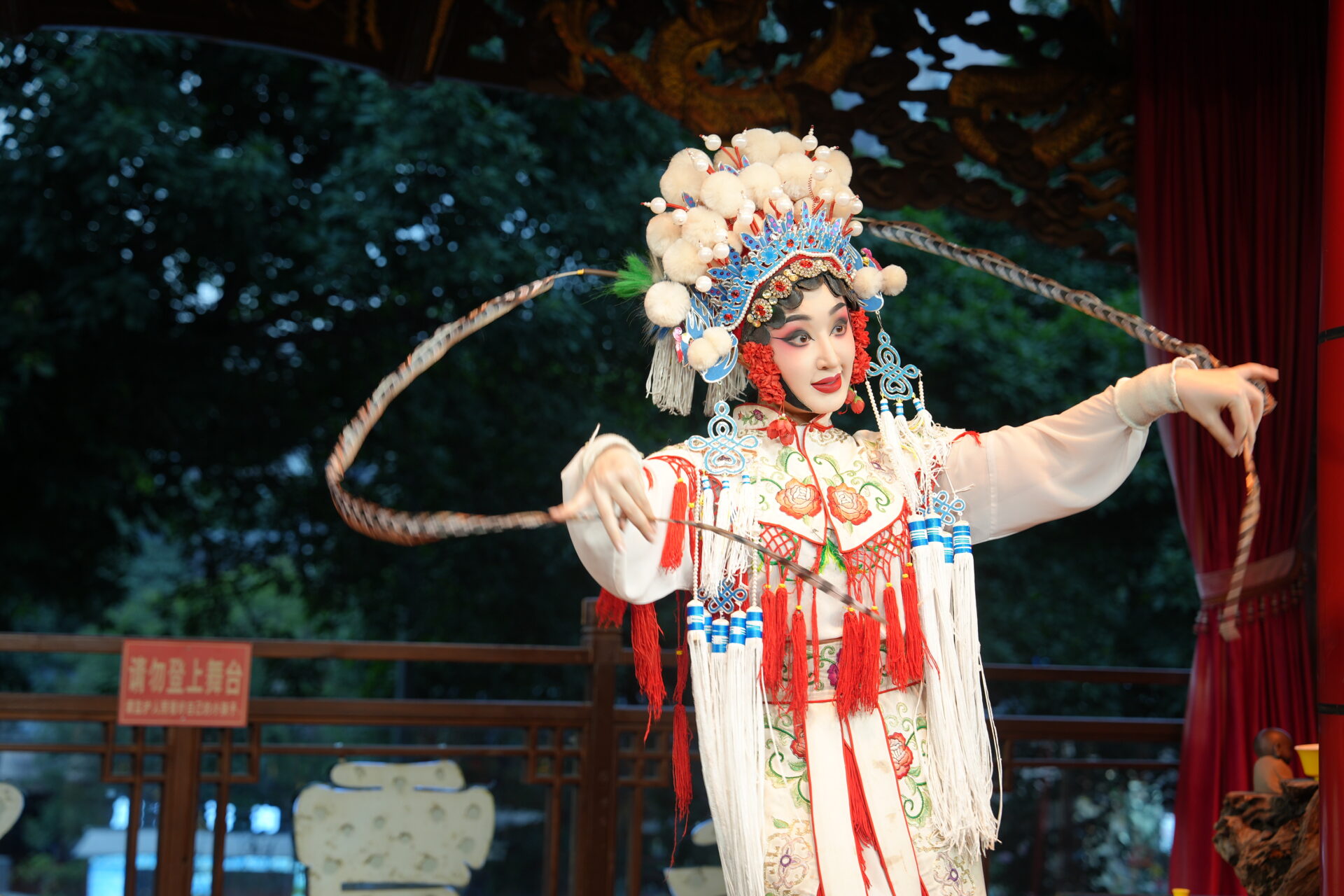 Performer in traditional costume during a Sichuan opera show in China